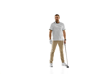 Image showing Golf player in a white shirt practicing, playing isolated on white studio background