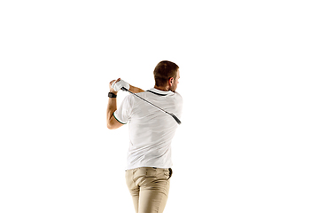 Image showing Golf player in a white shirt taking a swing isolated on white studio background