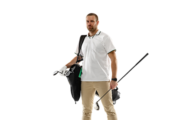 Image showing Golf player in a white shirt practicing, playing isolated on white studio background