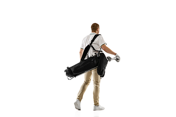 Image showing Golf player in a white shirt practicing, playing isolated on white studio background