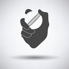 Image showing Hand holding cricket ball icon