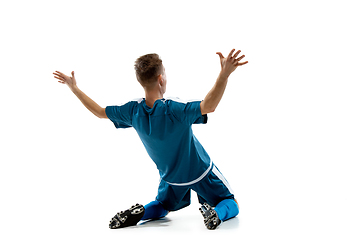 Image showing Funny emotions of professional soccer player isolated on white studio background, excitement in game