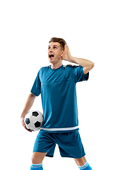 Image showing Funny emotions of professional soccer player isolated on white studio background, excitement in game