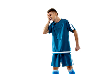 Image showing Funny emotions of professional soccer player isolated on white studio background, excitement in game