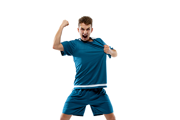 Image showing Funny emotions of professional soccer player isolated on white studio background, excitement in game