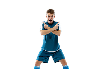 Image showing Funny emotions of professional soccer player isolated on white studio background, excitement in game