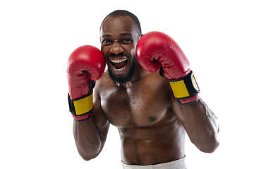 Image showing Bright emotions of professional boxer isolated on white studio background, excitement in game