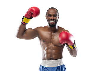 Image showing Bright emotions of professional boxer isolated on white studio background, excitement in game