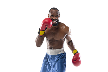 Image showing Bright emotions of professional boxer isolated on white studio background, excitement in game