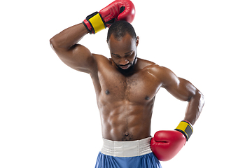 Image showing Bright emotions of professional boxer isolated on white studio background, excitement in game