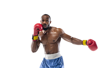 Image showing Bright emotions of professional boxer isolated on white studio background, excitement in game