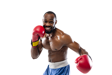 Image showing Bright emotions of professional boxer isolated on white studio background, excitement in game