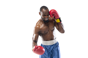 Image showing Bright emotions of professional boxer isolated on white studio background, excitement in game