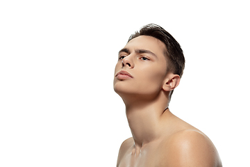 Image showing Portrait of young man isolated on white studio background. Caucasian attractive male model. Concept of fashion and beauty, self-care, body and skin care.