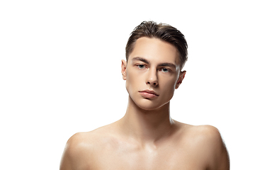 Image showing Portrait of young man isolated on white studio background. Caucasian attractive male model. Concept of fashion and beauty, self-care, body and skin care.