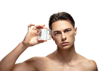 Image showing Portrait of young man isolated on white studio background. Caucasian attractive male model. Concept of fashion and beauty, self-care, body and skin care.