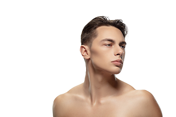 Image showing Portrait of young man isolated on white studio background. Caucasian attractive male model. Concept of fashion and beauty, self-care, body and skin care.