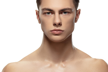 Image showing Portrait of young man isolated on white studio background. Caucasian attractive male model. Concept of fashion and beauty, self-care, body and skin care.