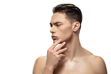 Image showing Portrait of young man isolated on white studio background. Caucasian attractive male model. Concept of fashion and beauty, self-care, body and skin care.