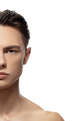 Image showing Portrait of young man isolated on white studio background. Caucasian attractive male model. Concept of fashion and beauty, self-care, body and skin care.