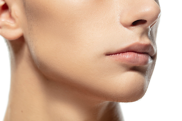 Image showing Close up face of young man isolated on white studio background. Caucasian attractive male model. Concept of fashion and beauty, self-care, body and skin care.