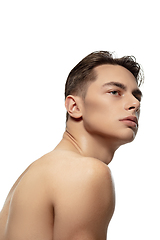 Image showing Portrait of young man isolated on white studio background. Caucasian attractive male model. Concept of fashion and beauty, self-care, body and skin care.