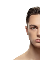 Image showing Portrait of young man isolated on white studio background. Caucasian attractive male model. Concept of fashion and beauty, self-care, body and skin care.