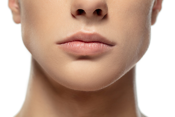 Image showing Close up face of young man isolated on white studio background. Caucasian attractive male model. Concept of fashion and beauty, self-care, body and skin care.