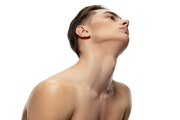 Image showing Portrait of young man isolated on white studio background. Caucasian attractive male model. Concept of fashion and beauty, self-care, body and skin care.