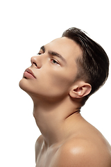 Image showing Portrait of young man isolated on white studio background. Caucasian attractive male model. Concept of fashion and beauty, self-care, body and skin care.