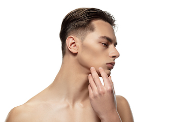 Image showing Portrait of young man isolated on white studio background. Caucasian attractive male model. Concept of fashion and beauty, self-care, body and skin care.