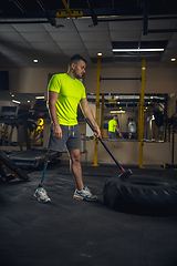 Image showing Disabled man training in the gym of rehabilitation center