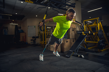 Image showing Disabled man training in the gym of rehabilitation center