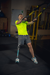 Image showing Disabled man training in the gym of rehabilitation center