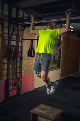 Image showing Disabled man training in the gym of rehabilitation center