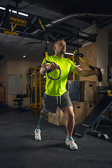 Image showing Disabled man training in the gym of rehabilitation center