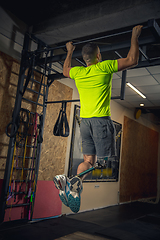 Image showing Disabled man training in the gym of rehabilitation center