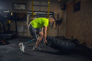 Image showing Disabled man training in the gym of rehabilitation center