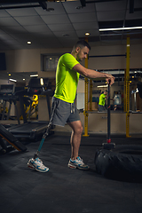 Image showing Disabled man training in the gym of rehabilitation center