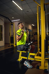 Image showing Disabled man training in the gym of rehabilitation center