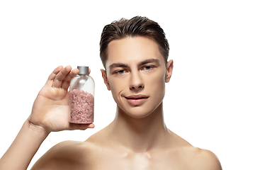 Image showing Portrait of young man isolated on white studio background. Caucasian attractive male model. Concept of fashion and beauty, self-care, body and skin care.