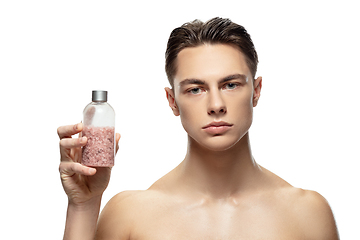 Image showing Portrait of young man isolated on white studio background. Caucasian attractive male model. Concept of fashion and beauty, self-care, body and skin care.