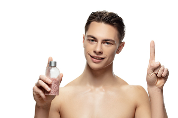 Image showing Portrait of young man isolated on white studio background. Caucasian attractive male model. Concept of fashion and beauty, self-care, body and skin care.