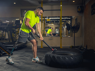 Image showing Disabled man training in the gym of rehabilitation center