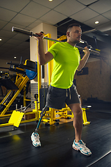 Image showing Disabled man training in the gym of rehabilitation center