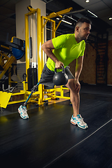 Image showing Disabled man training in the gym of rehabilitation center