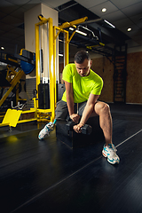 Image showing Disabled man training in the gym of rehabilitation center