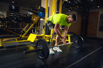 Image showing Disabled man training in the gym of rehabilitation center