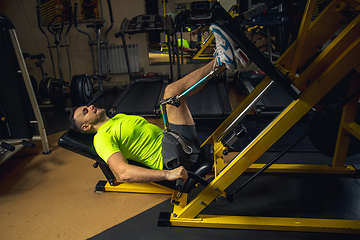 Image showing Disabled man training in the gym of rehabilitation center