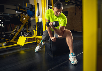 Image showing Disabled man training in the gym of rehabilitation center